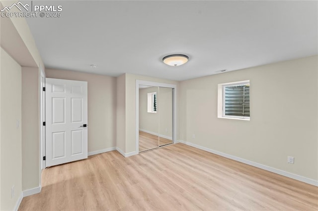 1005 Mountain View Rd, Woodland Park, CO 80863 - unfurnished bedroom with light wood-style flooring and a closet