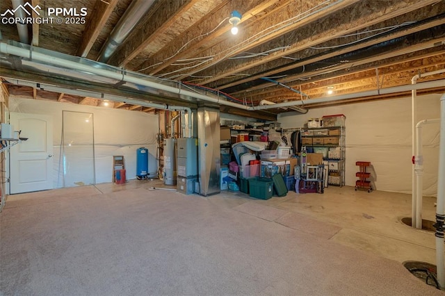 17529 Old Cherokee Trl, Colorado Springs, CO 80921 - unfinished basement featuring water heater and a water pressure tank