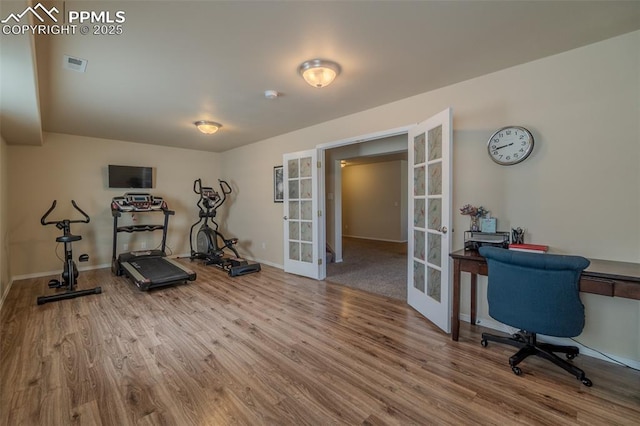 17529 Old Cherokee Trl, Colorado Springs, CO 80921 - workout room with french doors and wood finished floors