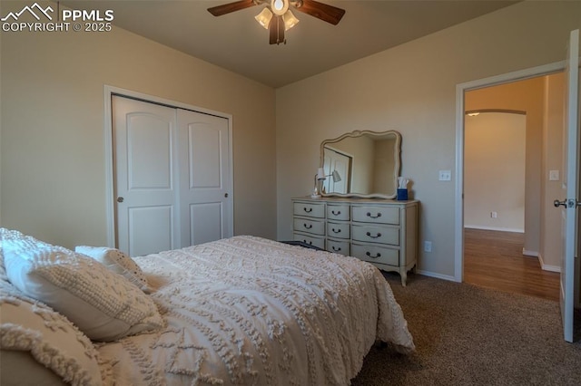 17529 Old Cherokee Trl, Colorado Springs, CO 80921 - carpeted bedroom featuring a closet, ceiling fan, and arched walkways
