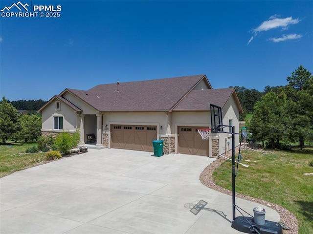 17529 Old Cherokee Trl, Colorado Springs, CO 80921 - view of front of property featuring stone siding, stucco siding, and a garage