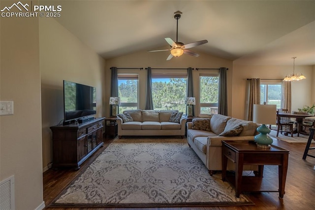 17529 Old Cherokee Trl, Colorado Springs, CO 80921 - living room featuring ceiling fan, wood finished floors, vaulted ceiling, and a chandelier