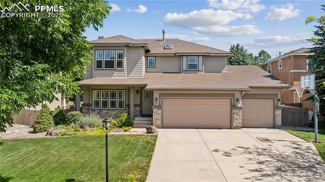 2664 Emerald Ridge Dr, Colorado Springs, CO 80920 - view of front of home featuring concrete driveway, roof with shingles, stone siding, and a garage