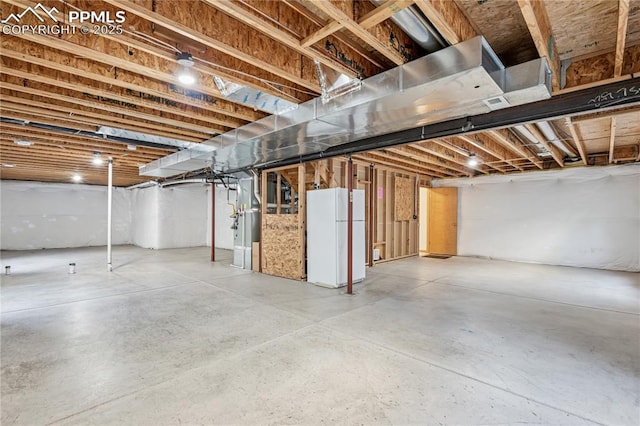 2664 Emerald Ridge Dr, Colorado Springs, CO 80920 - unfinished basement with freestanding refrigerator