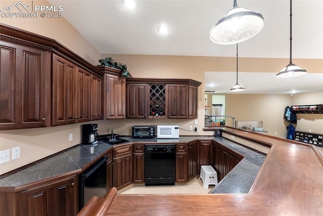 2585 Dunfries Ct, Colorado Springs, CO 80919 - kitchen with black dishwasher, tile countertops, dark brown cabinetry, white microwave, and recessed lighting