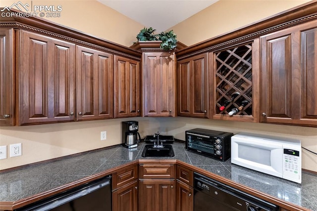 2585 Dunfries Ct, Colorado Springs, CO 80919 - kitchen with tile countertops, black dishwasher, white microwave, and dark brown cabinetry