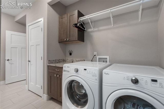 501 N Franklin St, Colorado Springs, CO 80903 - washroom with washing machine and clothes dryer and cabinet space