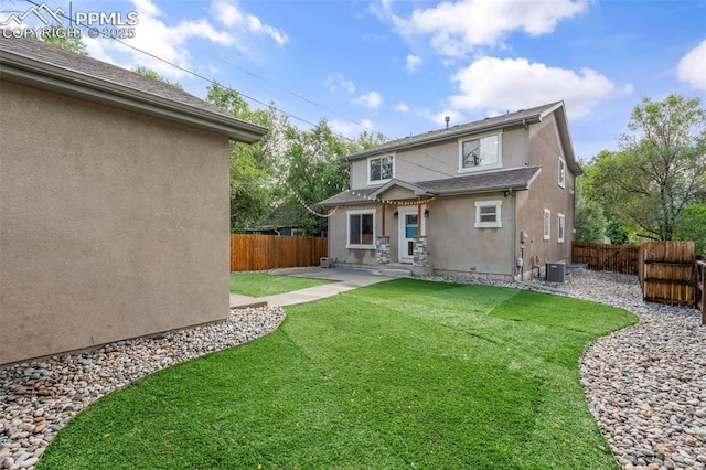 501 N Franklin St, Colorado Springs, CO 80903 - back of house featuring stucco siding, a fenced backyard, and a patio area