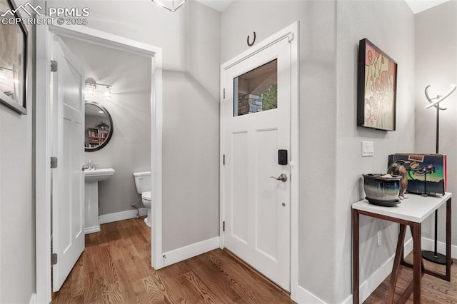 501 N Franklin St, Colorado Springs, CO 80903 - entryway with wood finished floors and baseboards