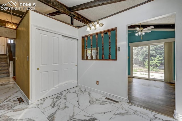 5926 Del Paz Dr, Colorado Springs, CO 80918 - unfurnished dining area with marble look tile flooring, ceiling fan, stairway, a chandelier, and beam ceiling