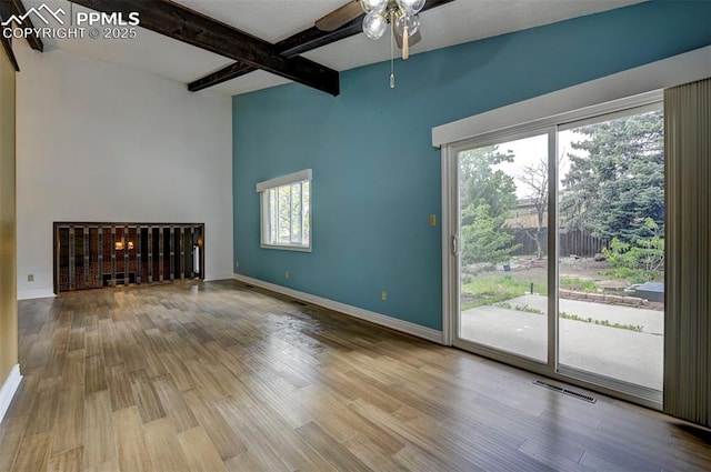 5926 Del Paz Dr, Colorado Springs, CO 80918 - spare room with beamed ceiling, wood finished floors, and ceiling fan