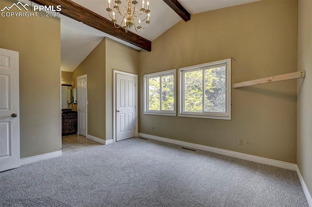 5926 Del Paz Dr, Colorado Springs, CO 80918 - unfurnished bedroom featuring a chandelier, carpet, and ensuite bath
