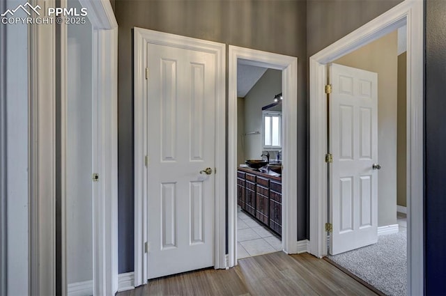 5926 Del Paz Dr, Colorado Springs, CO 80918 - hall featuring wood finished floors and baseboards