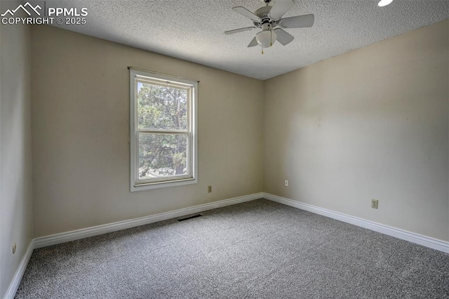 5926 Del Paz Dr, Colorado Springs, CO 80918 - carpeted empty room featuring a textured ceiling and a ceiling fan