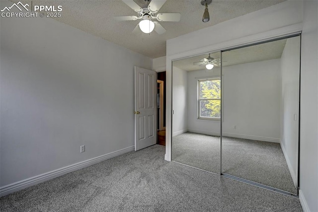 5926 Del Paz Dr, Colorado Springs, CO 80918 - unfurnished bedroom with carpet flooring, a textured ceiling, a closet, and ceiling fan