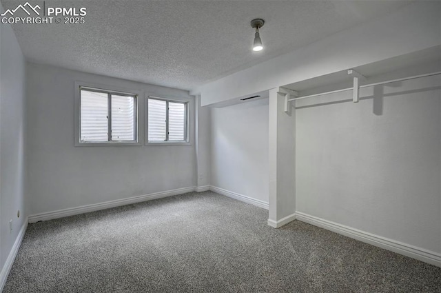 5926 Del Paz Dr, Colorado Springs, CO 80918 - unfurnished bedroom featuring carpet floors and a textured ceiling