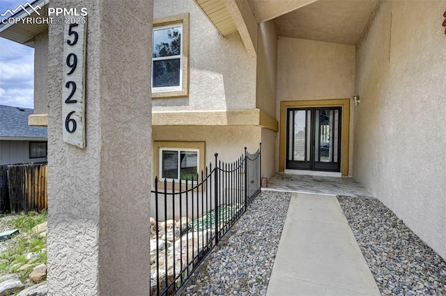 5926 Del Paz Dr, Colorado Springs, CO 80918 - view of exterior entry with stucco siding