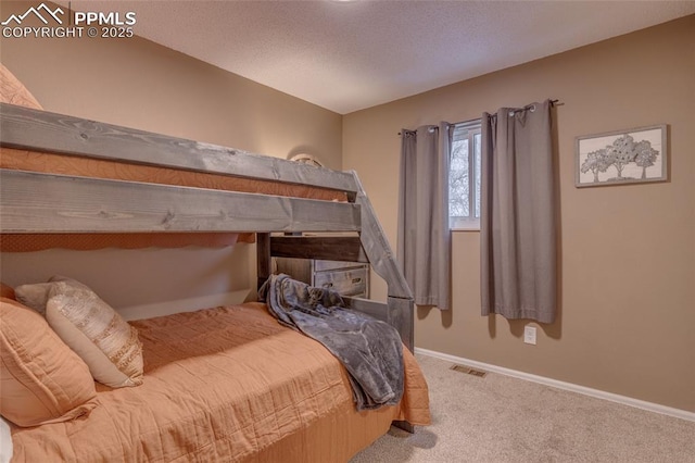 1607 N Chestnut St, Colorado Springs, CO 80907 - bedroom with carpet and baseboards
