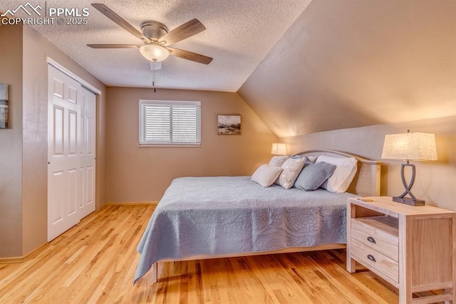 1607 N Chestnut St, Colorado Springs, CO 80907 - bedroom featuring wood finished floors, a textured ceiling, a closet, ceiling fan, and vaulted ceiling