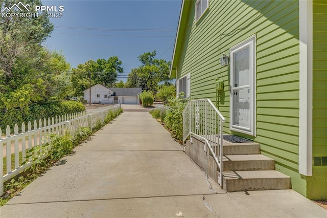 1607 N Chestnut St, Colorado Springs, CO 80907 - view of patio / terrace with a detached garage