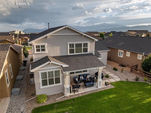 4296 New Santa Fe Trl, Colorado Springs, CO 80924 - back of property with outdoor lounge area, a mountain view, a patio, a residential view, and stucco siding
