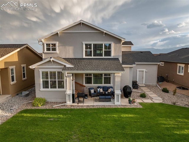 4296 New Santa Fe Trl, Colorado Springs, CO 80924 - rear view of property with an outdoor hangout area, a patio area, a lawn, and stucco siding