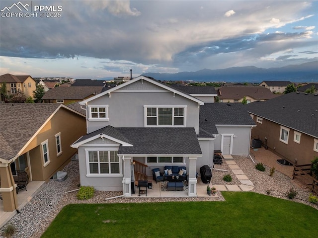 4296 New Santa Fe Trl, Colorado Springs, CO 80924 - rear view of house featuring outdoor lounge area, a mountain view, a patio, a residential view, and stucco siding