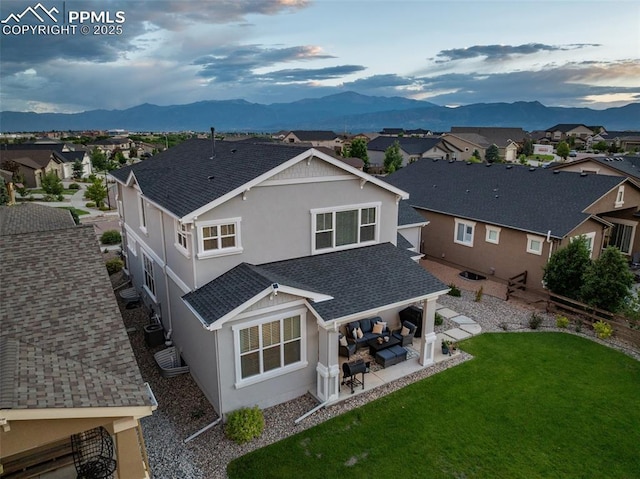 4296 New Santa Fe Trl, Colorado Springs, CO 80924 - rear view of property with an outdoor hangout area, a mountain view, a residential view, and a shingled roof