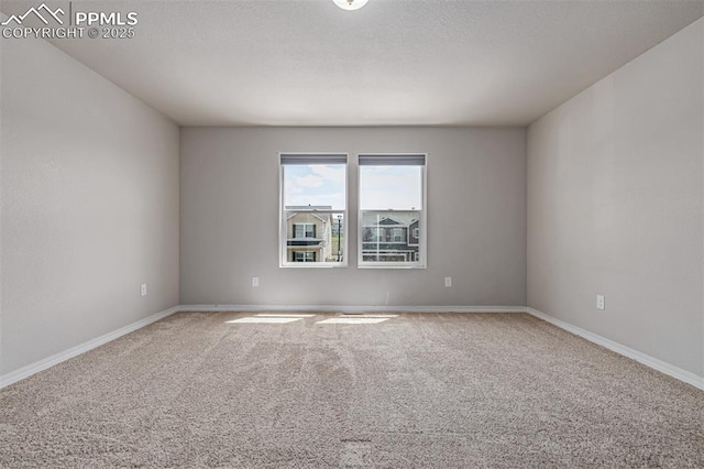 10726 Traders Pkwy, Fountain, CO 80817 - carpeted empty room featuring baseboards