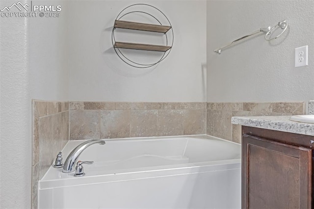 10726 Traders Pkwy, Fountain, CO 80817 - full bath with vanity and a garden tub
