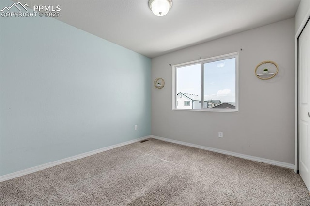 10726 Traders Pkwy, Fountain, CO 80817 - carpeted spare room featuring baseboards