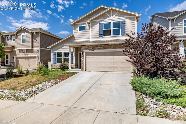 10726 Traders Pkwy, Fountain, CO 80817 - view of front of home with stone siding, a garage, and concrete driveway