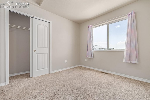 10726 Traders Pkwy, Fountain, CO 80817 - unfurnished bedroom with carpet floors and a closet