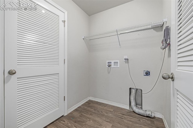 10726 Traders Pkwy, Fountain, CO 80817 - laundry area with electric dryer hookup, dark wood-style floors, and hookup for a washing machine