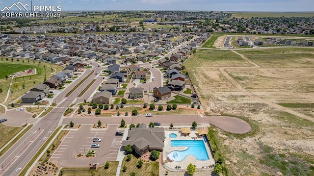 10726 Traders Pkwy, Fountain, CO 80817 - aerial overview of property's location with a pool area and nearby suburban area
