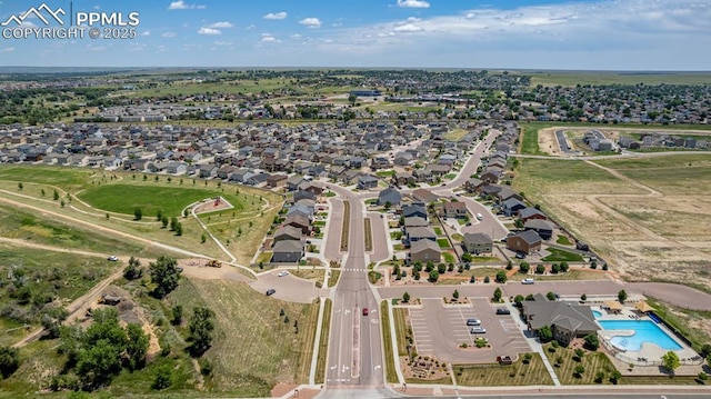 10726 Traders Pkwy, Fountain, CO 80817 - aerial view of property's location featuring a pool and nearby suburban area