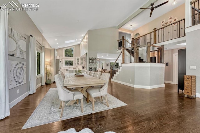 970 Bend In The Trail Rd, Monument, CO 80132 - dining space with stairway, dark wood-type flooring, a ceiling fan, and high vaulted ceiling