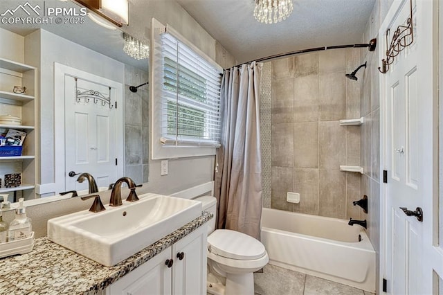 970 Bend In The Trail Rd, Monument, CO 80132 - bathroom with shower / bath combo, vanity, tile patterned floors, a chandelier, and a textured ceiling