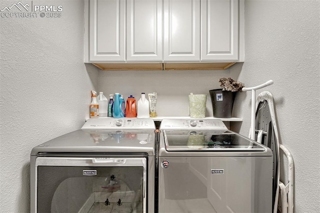 970 Bend In The Trail Rd, Monument, CO 80132 - laundry room featuring washer and dryer, cabinet space, and a textured wall