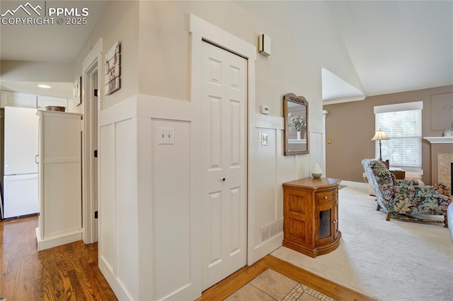 2527 Elite Ter, Colorado Springs, CO 80920 - corridor with wood finished floors and high vaulted ceiling