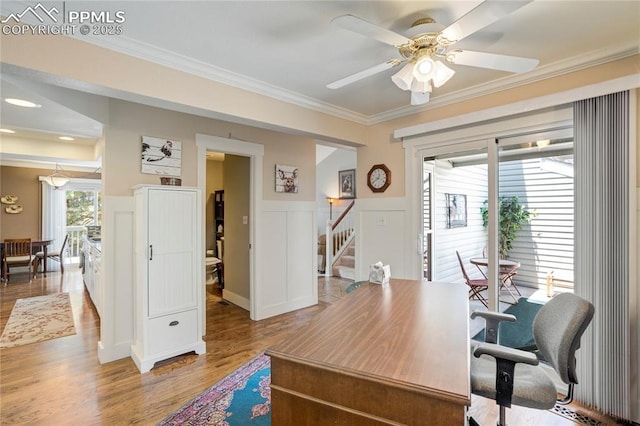 2527 Elite Ter, Colorado Springs, CO 80920 - office featuring light wood-style flooring, ornamental molding, a ceiling fan, wainscoting, and a decorative wall