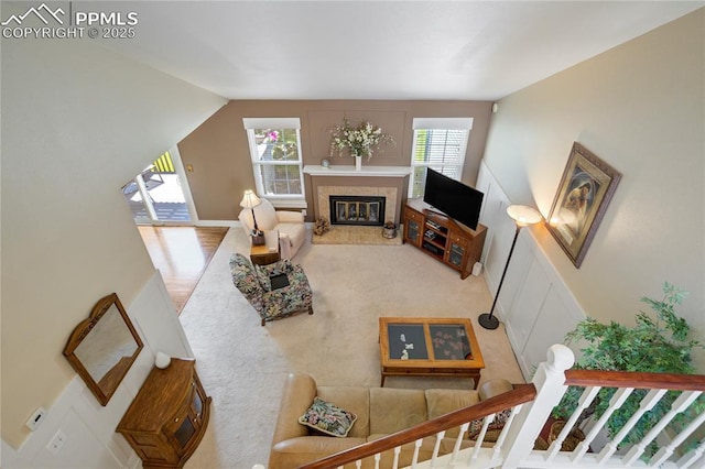 2527 Elite Ter, Colorado Springs, CO 80920 - living area featuring a fireplace and vaulted ceiling