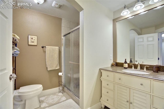 2527 Elite Ter, Colorado Springs, CO 80920 - full bathroom with tile patterned floors, vanity, and a shower stall