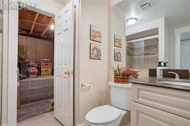 2527 Elite Ter, Colorado Springs, CO 80920 - full bath with vanity, a stall shower, and tile patterned flooring
