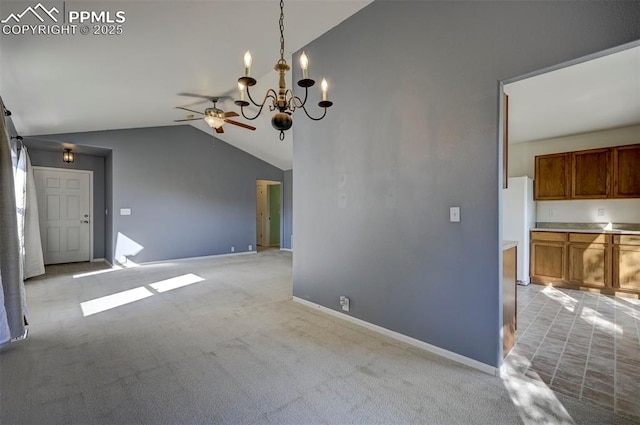 12874 Oakland Hills Rd, Peyton, CO 80831 - unfurnished dining area with vaulted ceiling, a chandelier, ceiling fan, and light colored carpet