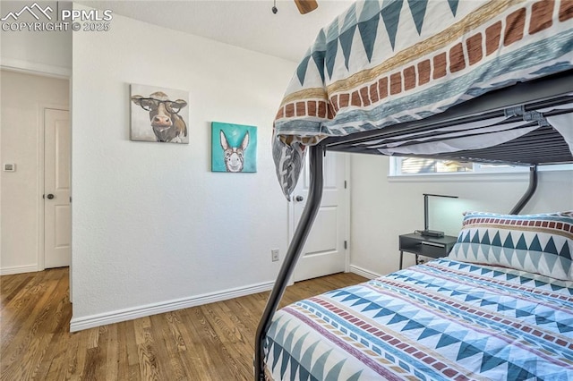 1633 N Chestnut St, Colorado Springs, CO 80907 - bedroom with wood finished floors and baseboards