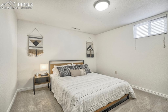 1633 N Chestnut St, Colorado Springs, CO 80907 - carpeted bedroom featuring baseboards