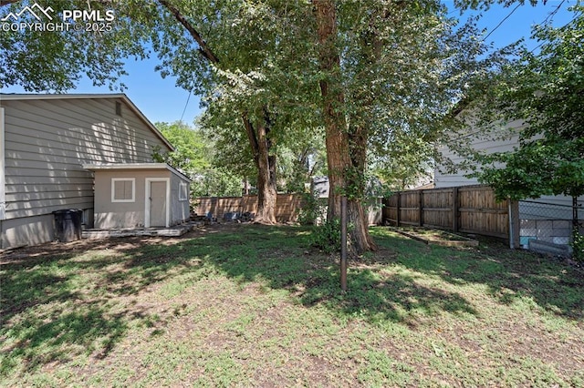 1633 N Chestnut St, Colorado Springs, CO 80907 - fenced backyard with a storage unit