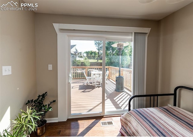 3730 Deep Haven Dr, Colorado Springs, CO 80920 - doorway to outside featuring wood finished floors and baseboards