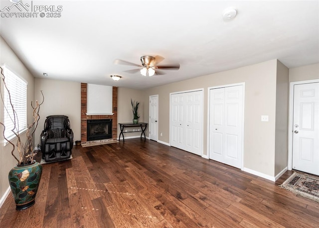 3730 Deep Haven Dr, Colorado Springs, CO 80920 - unfurnished living room with a ceiling fan, wood finished floors, and a fireplace